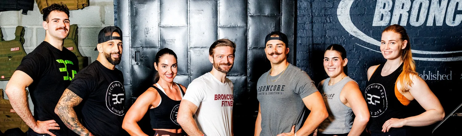 The full BronCore Fitness coaching team at the Downtown Boston studio